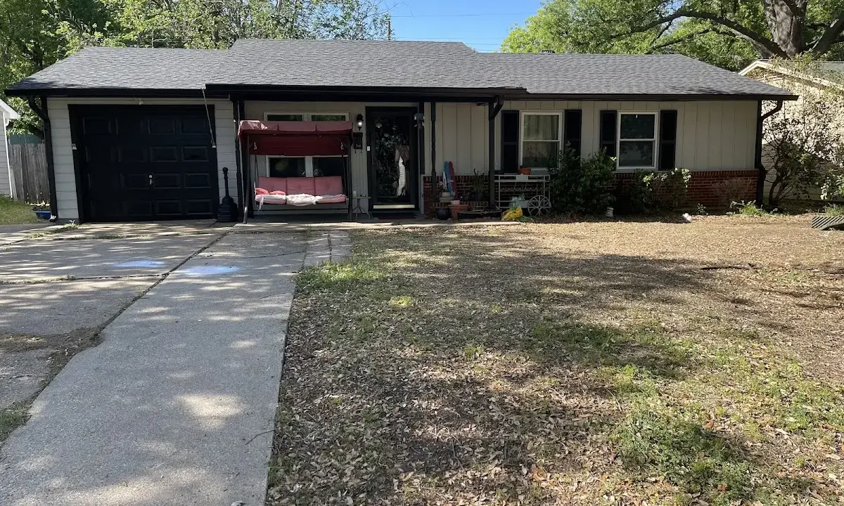 Asphalt Shingle Roof Repair crew at work on a residential roof in Fort Polk South